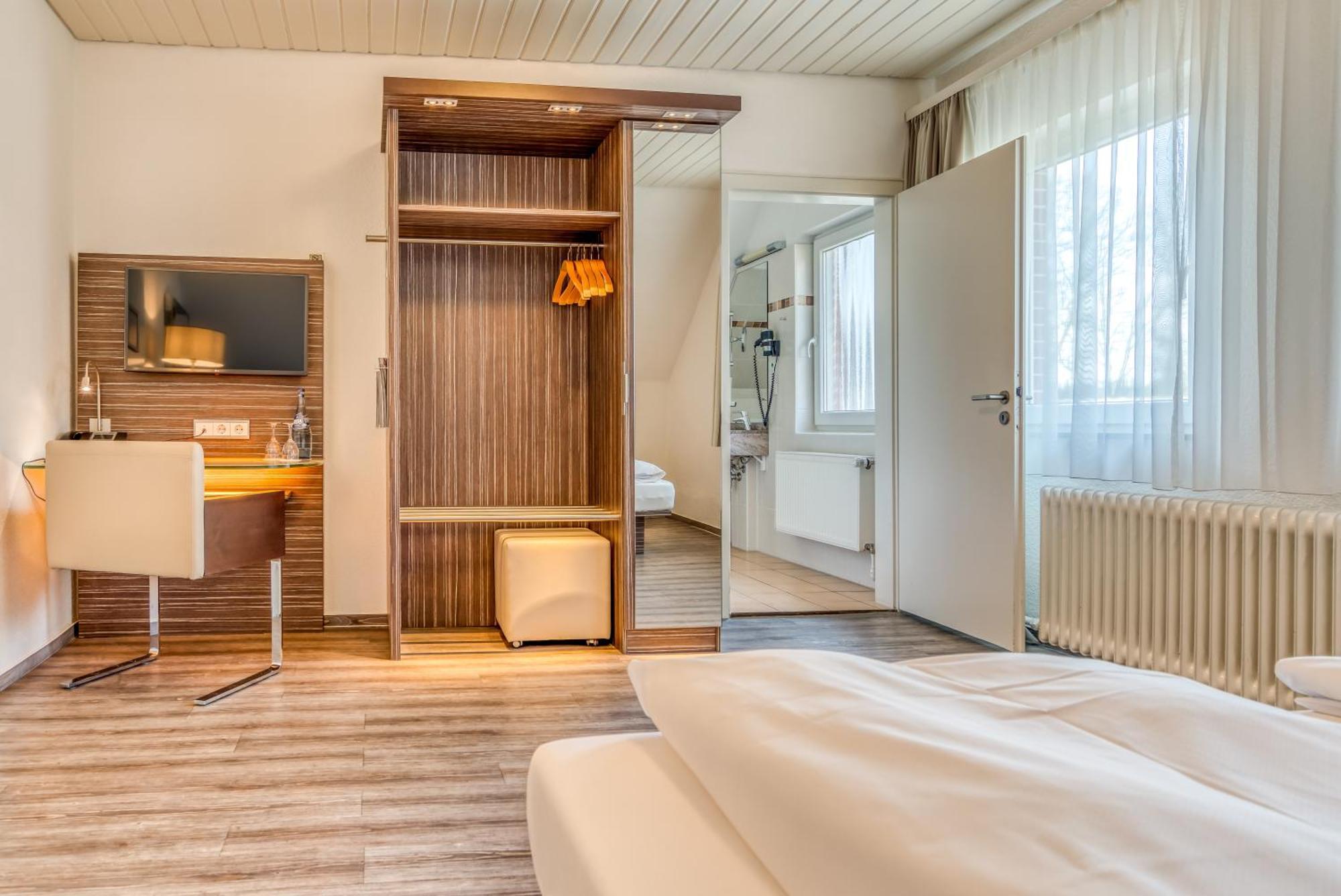 Ringhotel Forellenhof Валсроде Стая снимка